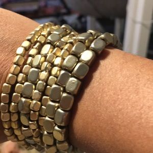 Set of Fossil gold bracelets